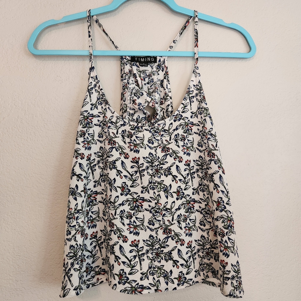 Timing ruffled open-back cami